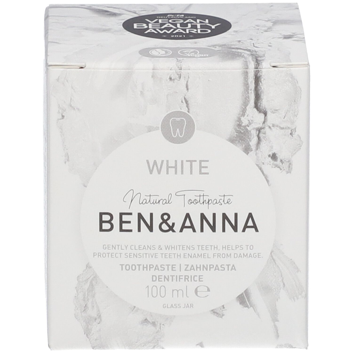 Boîte en carton avec informations sur le dentifrice et logo de la marque. Vegan Beauty Award 2021.