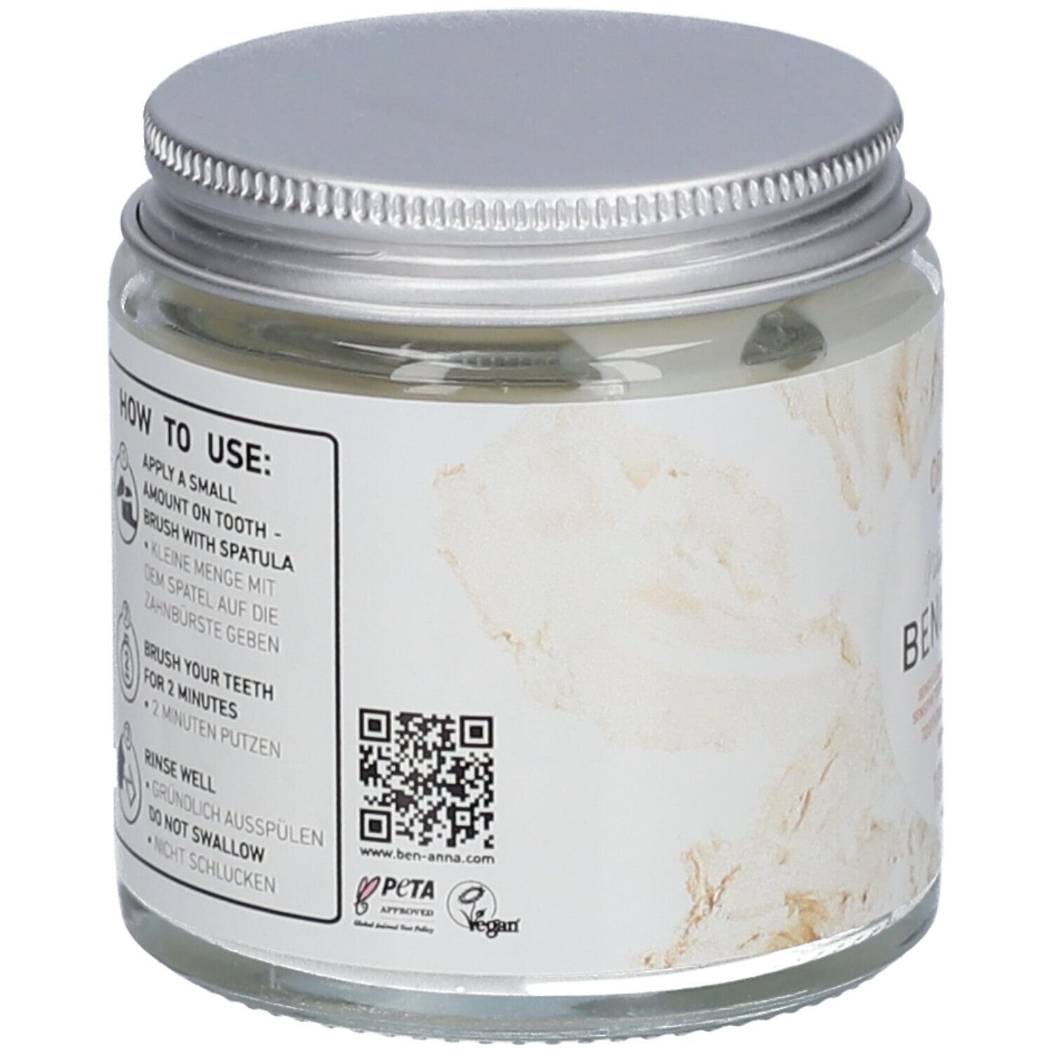 Dos du pot de dentifrice en verre. Mode d'emploi, code QR, logo PETA, logo Vegan. Dentifrice Ben & Anna.