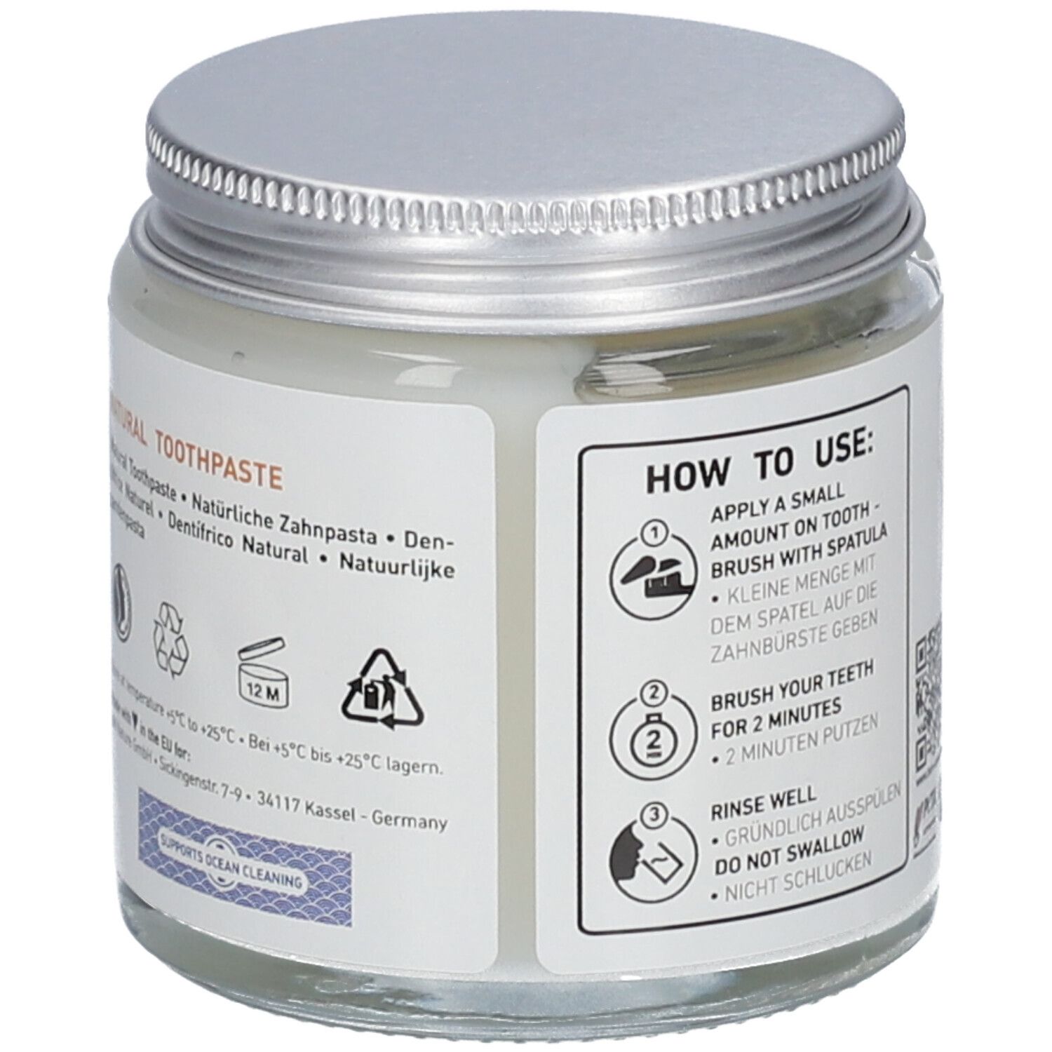 Dos du pot de dentifrice en verre. Mode d'emploi, symboles de recyclage, symbole 12M. Dentifrice Ben & Anna.