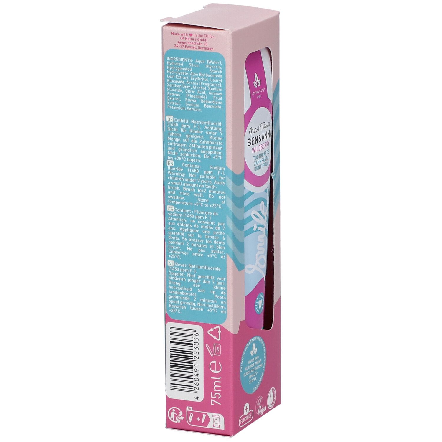 Dos de l'emballage du dentifrice. Texte multilingue, ingrédients et logos. Design rose et blanc avec motif vagues.