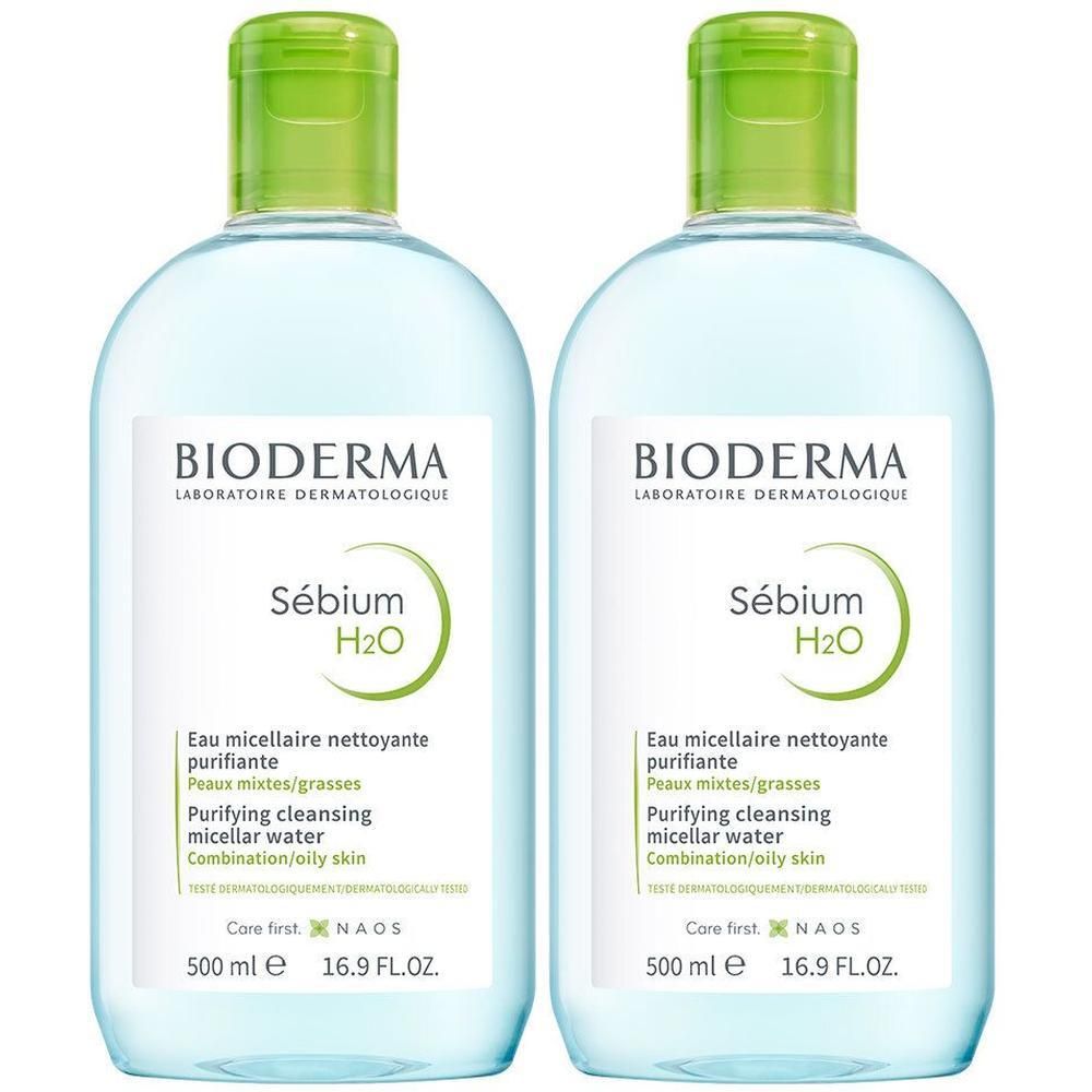 Deux flacons de nettoyant micellaire. Bouchon vert. Inscription: BIODERMA Sébium H2O, Eau micellaire nettoyante purifiante. 500 ml.
