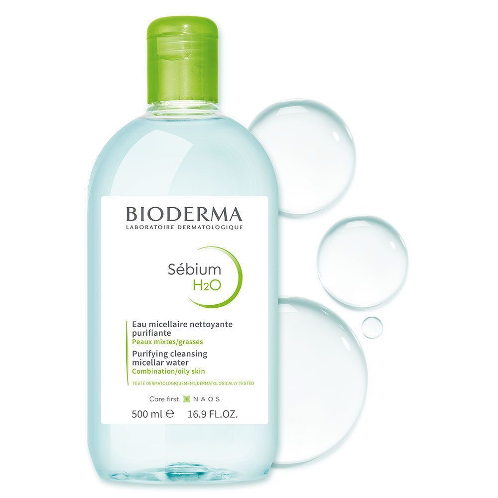 Flacon avec bouchon vert et trois gouttes d'eau. Inscription: BIODERMA Sébium H2O, Eau micellaire nettoyante purifiante. 500 ml.
