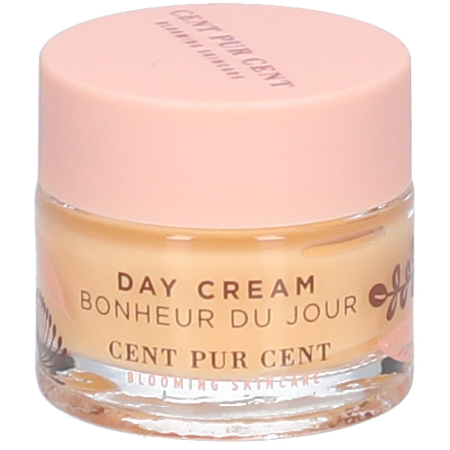 Pot de crème de jour. Inscription: DAY CREAM, BONHEUR DU JOUR, CENT PUR CENT. Couvercle rose, pot transparent.