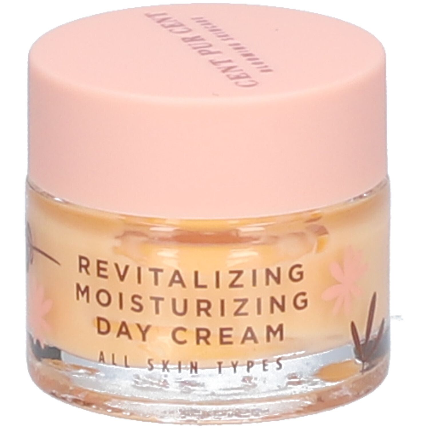 Pot de crème de jour. Inscription: REVITALIZING MOISTURIZING DAY CREAM. Couvercle rose, pot transparent.