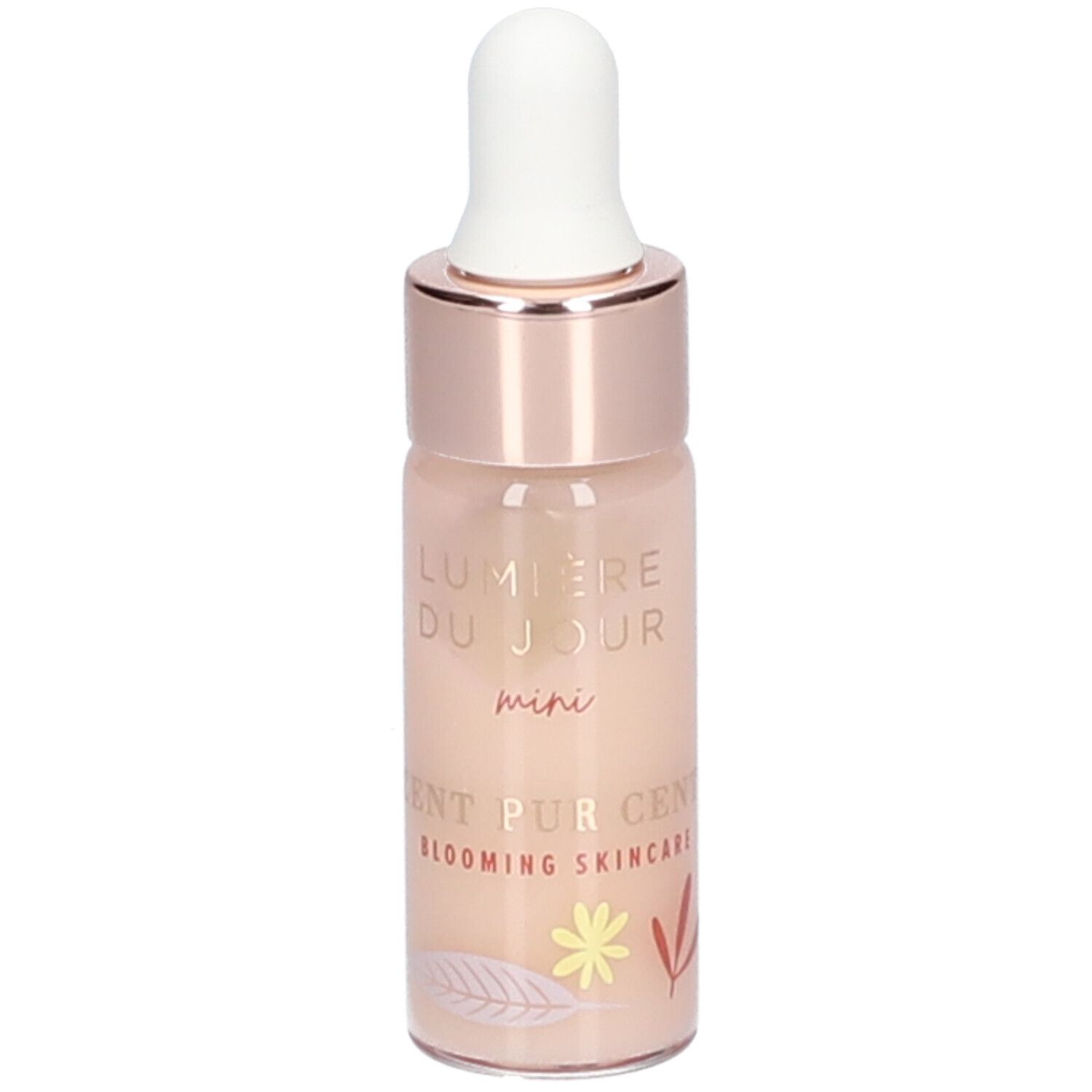 Petite bouteille avec pipette. Inscription : Lumière du Jour mini, Cent Pur Cent Blooming Skincare. Éléments décoratifs.