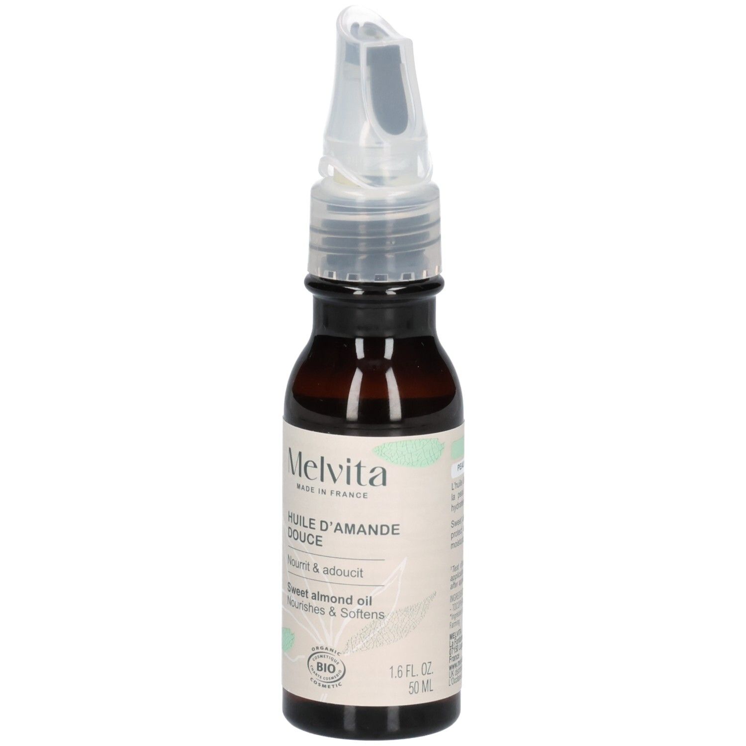 Flacon en verre brun avec applicateur. Inscription: Melvita Huile d'Amande Douce, certification BIO.