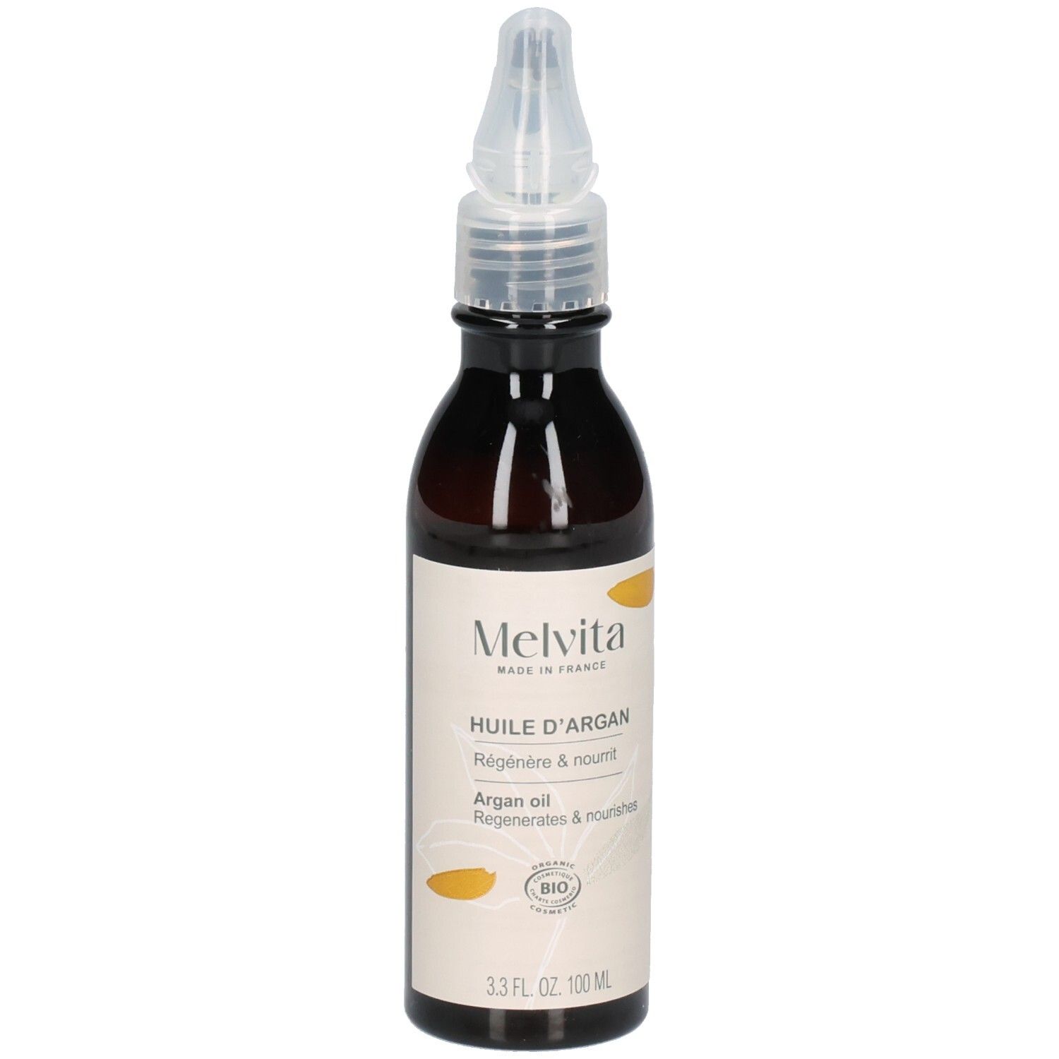 Flacon d'huile d'argan Melvita avec applicateur. Étiquette avec sceau BIO.