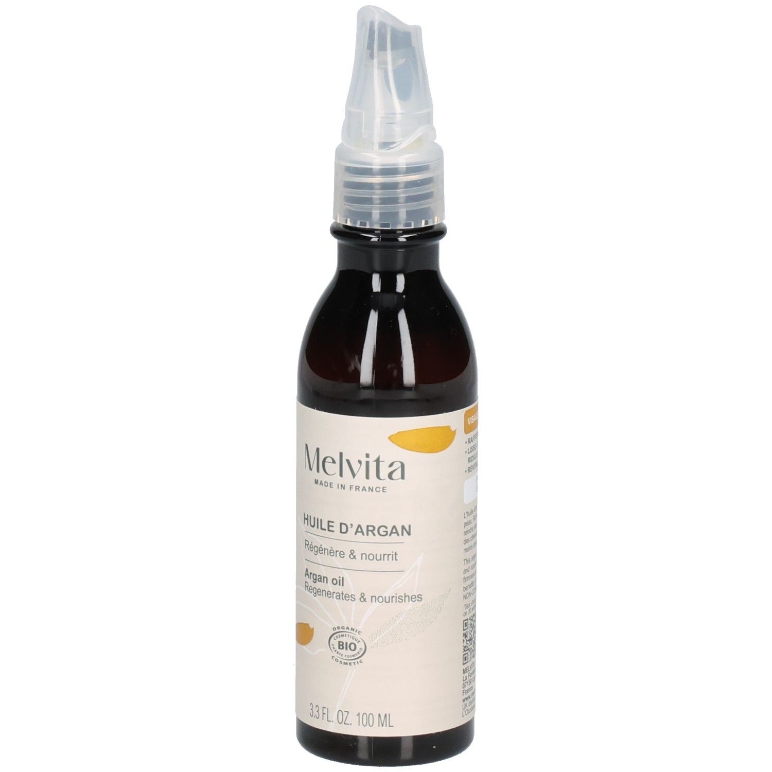 Flacon d'huile d'argan Melvita avec applicateur. Étiquette avec sceau BIO.
