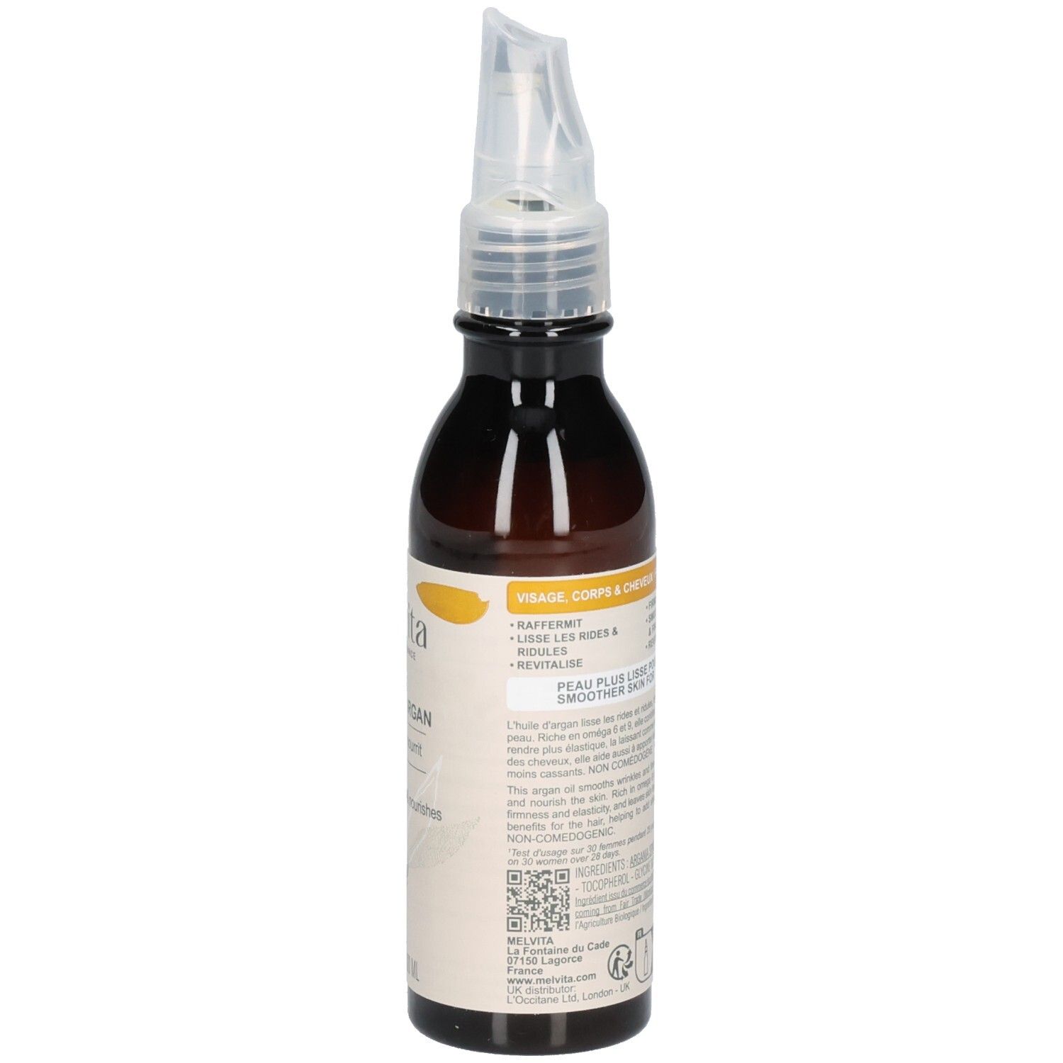 Flacon d'huile d'argan Melvita, vue de côté. Étiquette avec instructions d'utilisation.