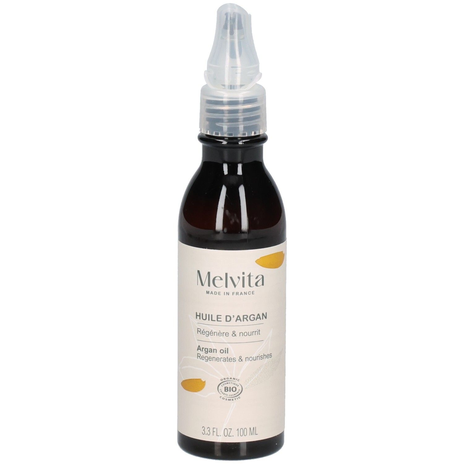 Flacon d'huile d'argan Melvita avec applicateur. Étiquette avec sceau BIO et informations produit.