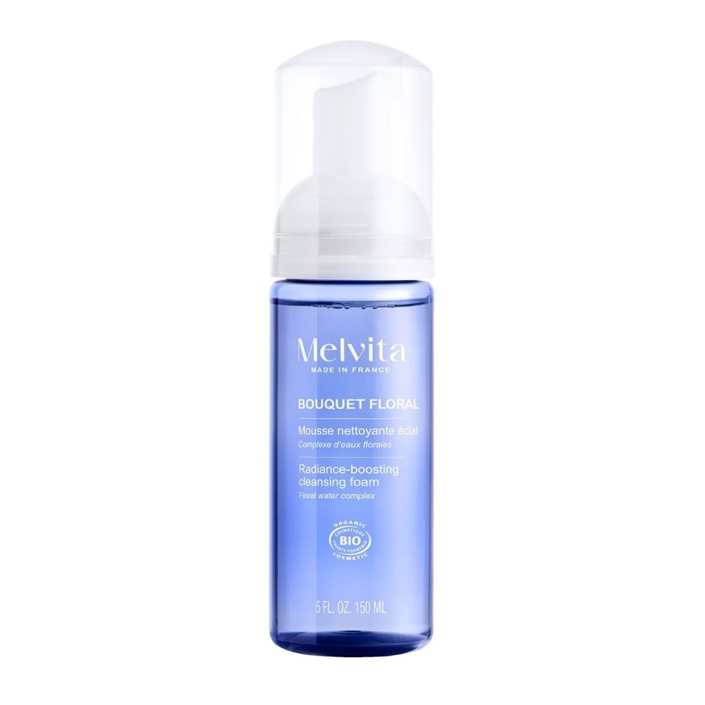 Mousse nettoyante Melvita avec pompe et capuchon transparent, flacon bleu.