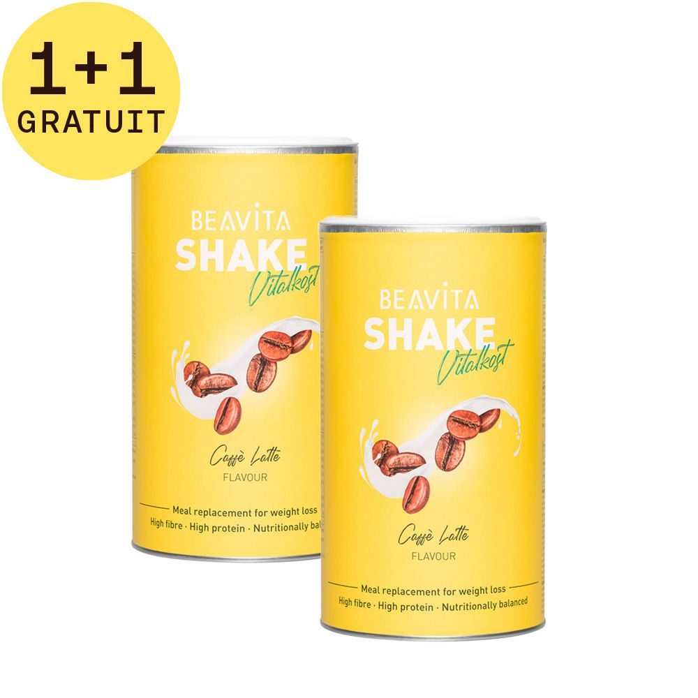 Deux boîtes jaunes Beavita Vitalkost Plus Caffè Latte. Inscription: Shake, illustration de grains de café, 1+1 GRATUIT.