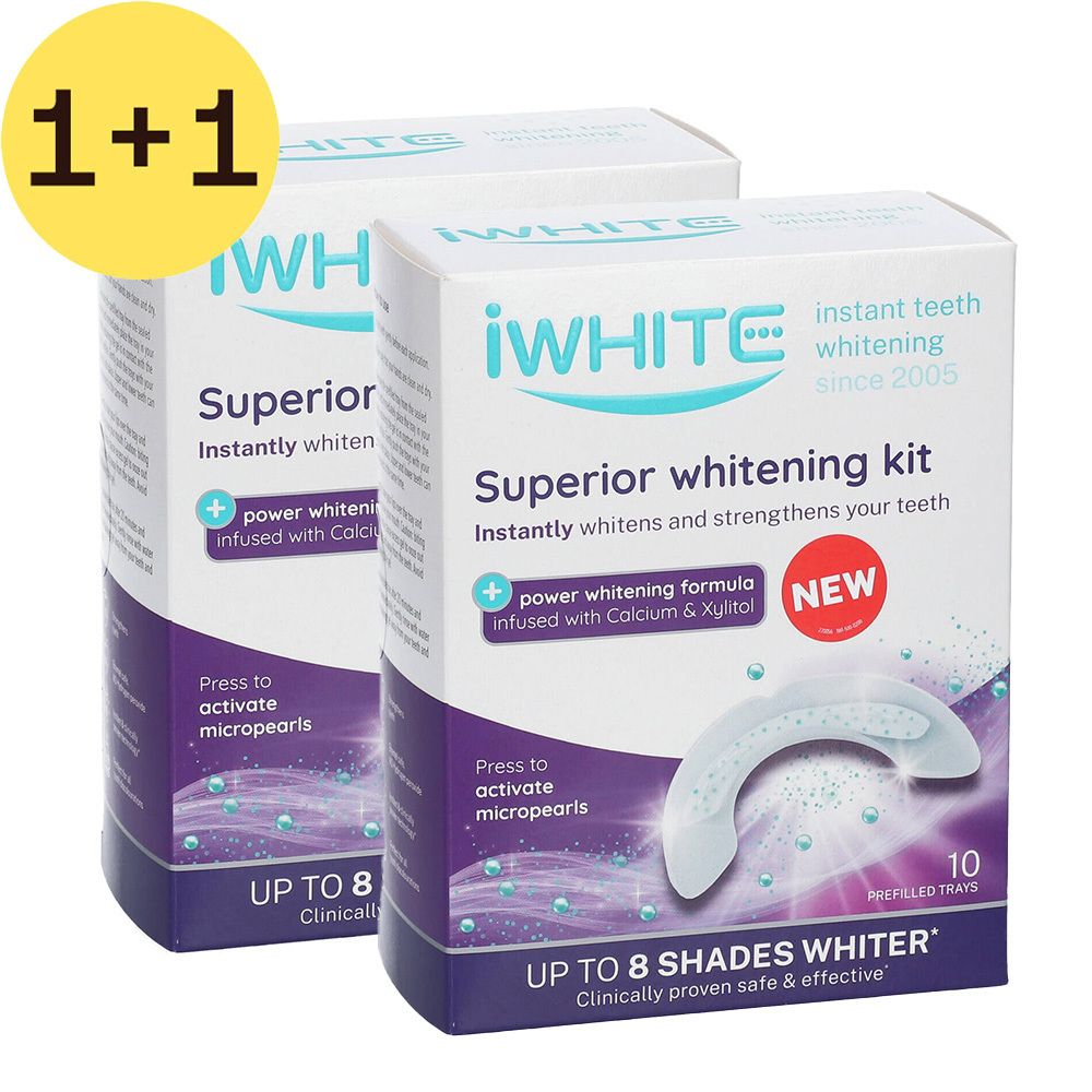 Deux boîtes de kit de blanchiment iWhite Superior. Inscription: Blanchiment instantané des dents. Contient 10 gouttières préremplies.