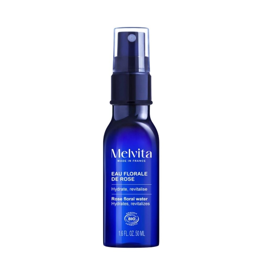 Flacon spray Melvita Eau Florale de Rose 50 ml, verre bleu, avec étiquette.