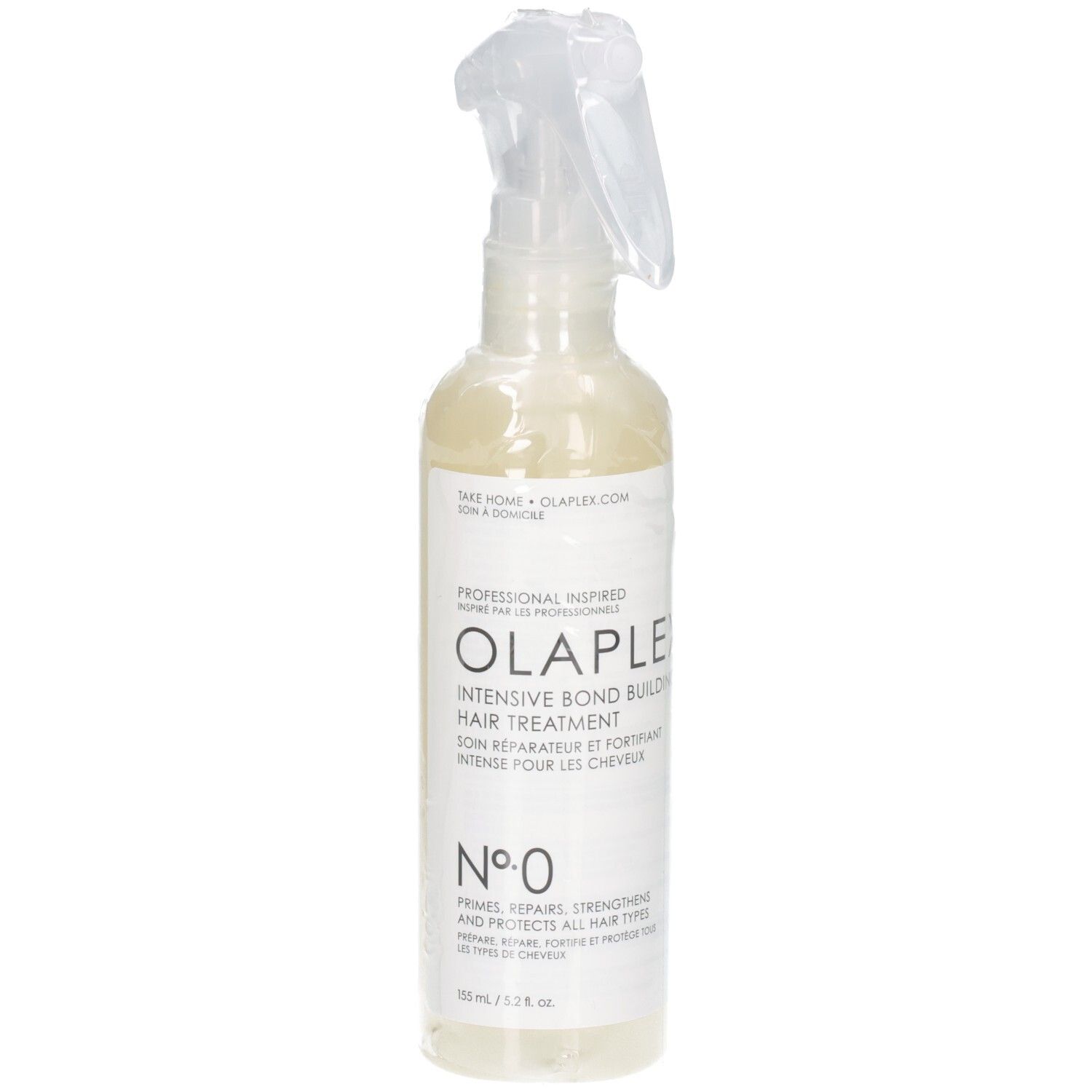 Traitement capillaire Olaplex Nº.0 dans un flacon pulvérisateur transparent avec étiquette blanche.