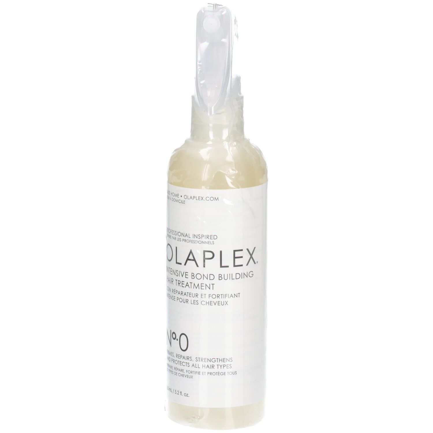 Traitement capillaire Olaplex Nº.0 dans un flacon pulvérisateur transparent, vue de face.