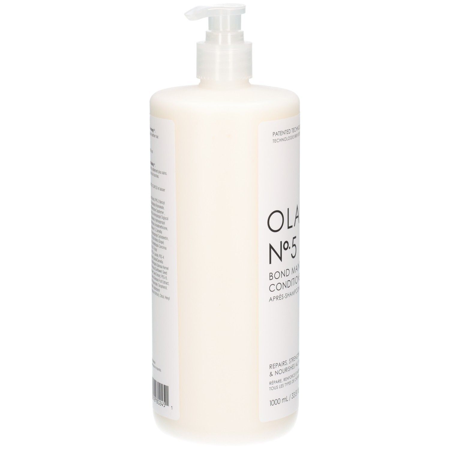 Vue latérale de la bouteille Olaplex N°5 Bond Maintenance Conditioner avec bouchon pompe.