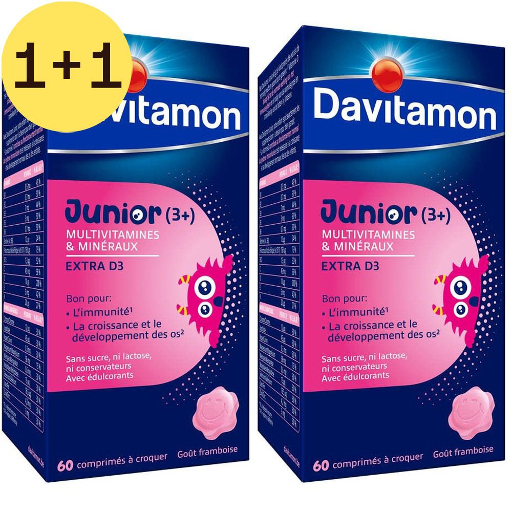 Deux boîtes de Davitamon Junior (3+). Emballage bleu avec nom du produit et informations. Avec image de bonbon rose, offre 1+1.
