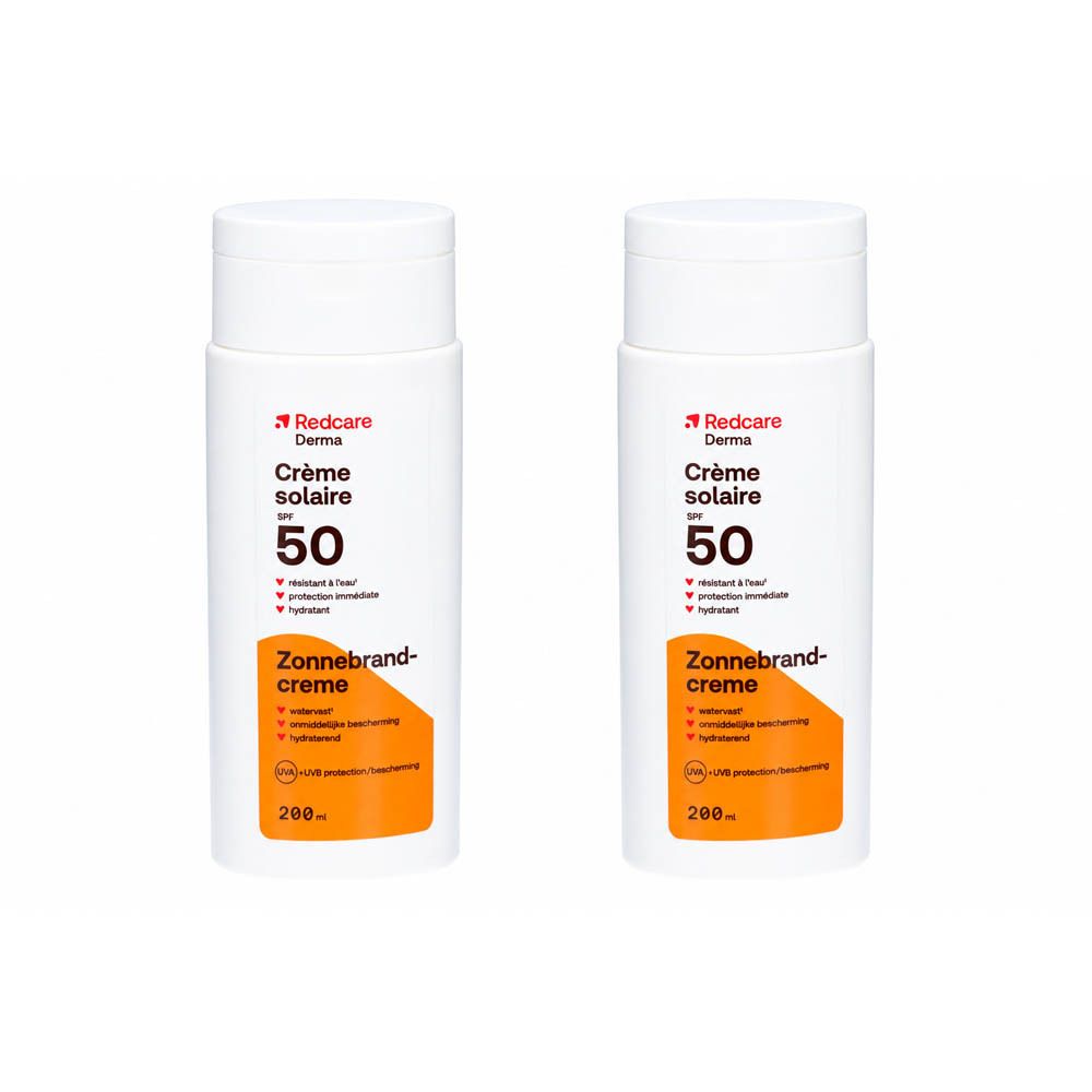 Deux flacons de crème solaire Redcare Derma SPF 50. Flacons blancs avec texte rouge et orange. 200 ml.