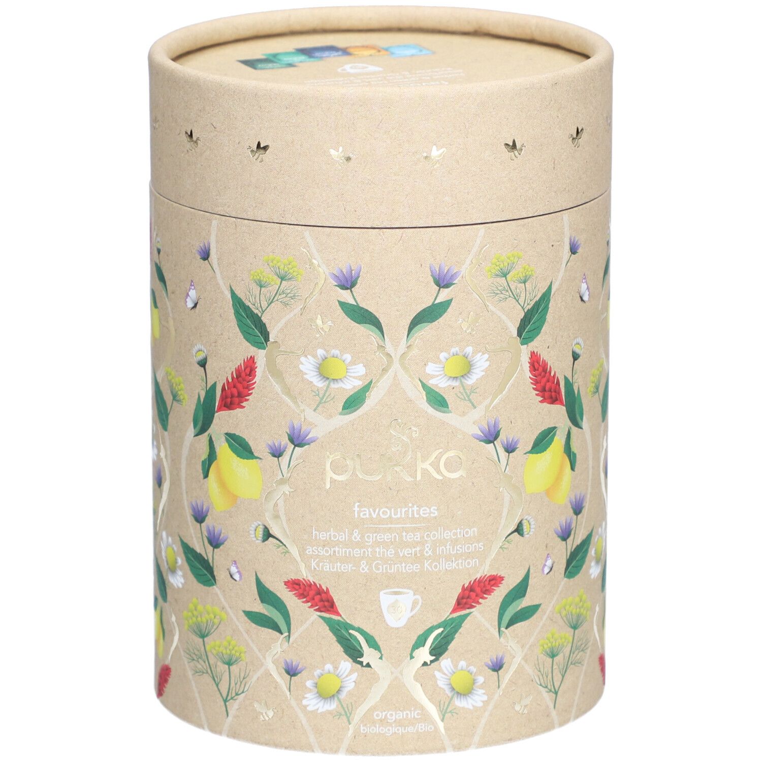 Emballage cylindrique en carton avec motifs floraux et nom du produit. Couvercle avec éléments colorés. Marque Pukka.