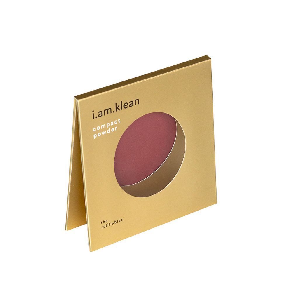Emballage doré ouvert. Visible : blush rond, couleur vin. Marque : i.am.klean. Texte : "compact powder".
