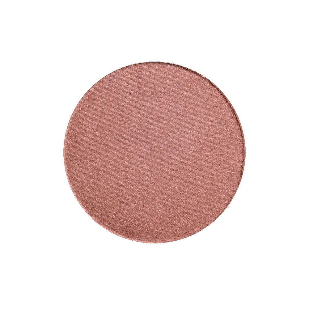 Blush rond rose. Surface lisse. Pas d'emballage visible.