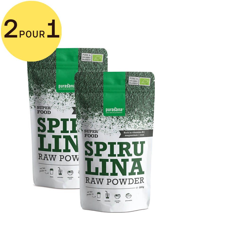 Deux sachets de poudre de spiruline Purasana. Inscription : Superfood, Spiruline, Raw Powder. Certification bio. Cercle jaune avec "2 pour 1".