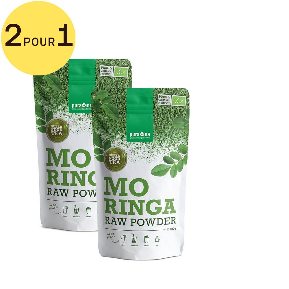 Deux sachets de poudre de Moringa Purasana. Inscription : Moringa Raw Powder, label bio, 2 pour 1. Emballage vert et blanc.