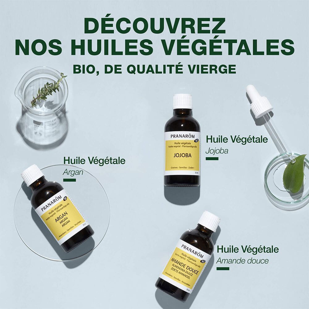 Plusieurs flacons avec texte: PRANAROM. Texte: Huile Végétale, Argan, Jojoba, Amande douce.