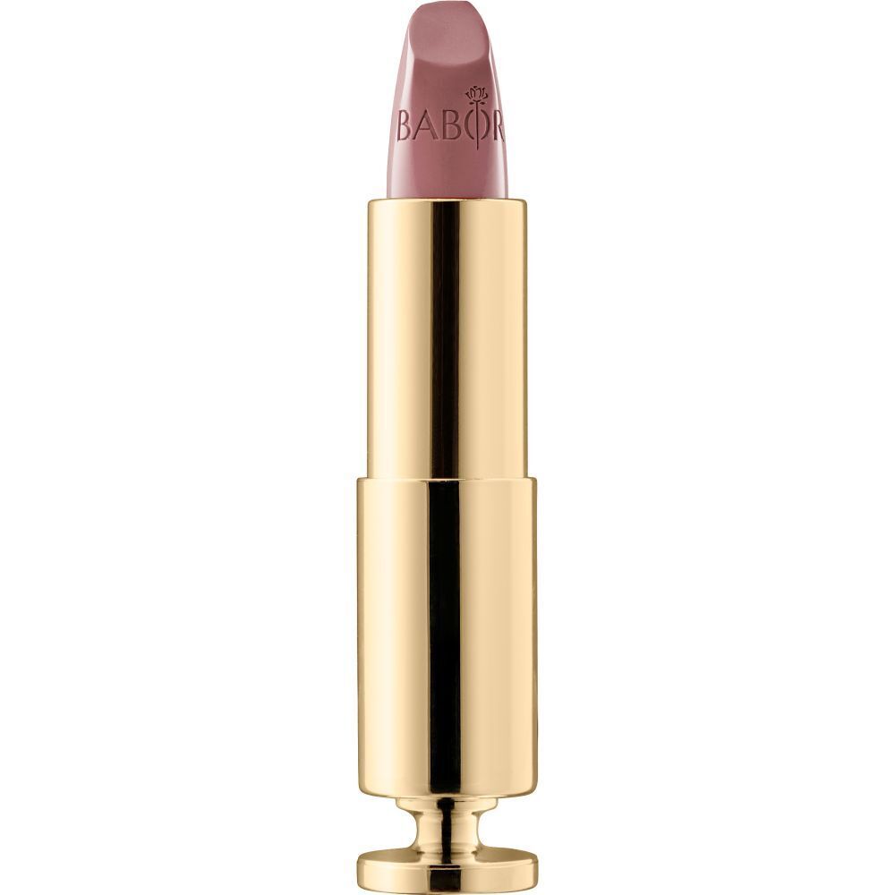 Rouge à lèvres doré avec embout rose clair. Marque Babor.