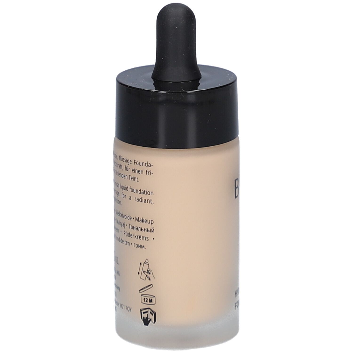 Flacon de fond de teint avec bouchon noir et pipette. Texte multilingue. 30 ml.