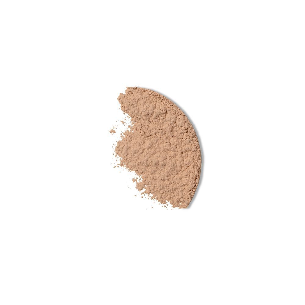 Poudre claire en forme de croissant sur fond blanc.