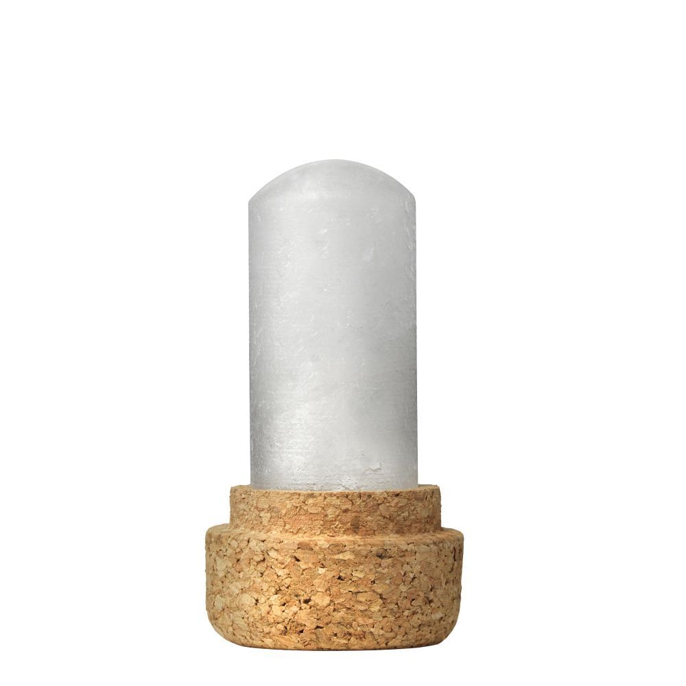 Stick de déodorant cylindrique transparent sur base en liège. Produit non emballé.