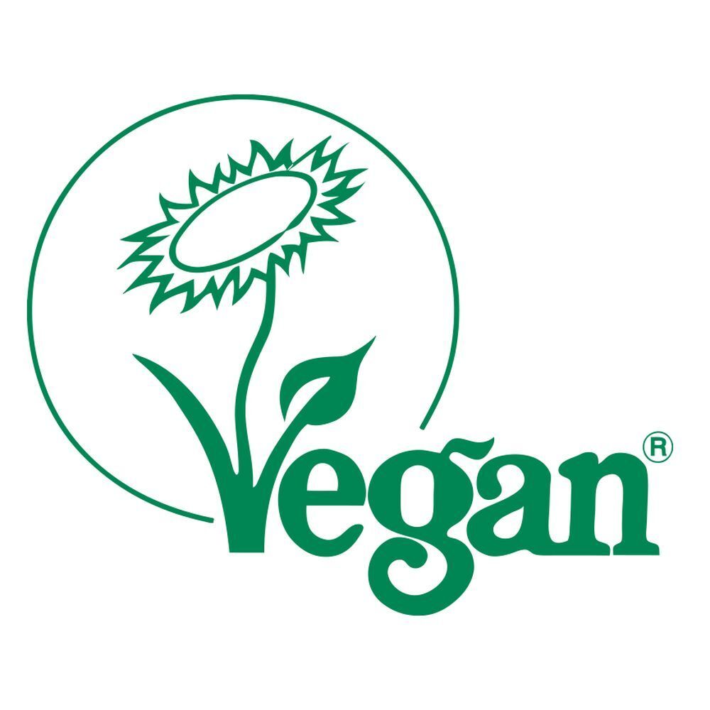 Autocollant rond vert. Logo vegan avec tournesol et feuilles. Fond blanc.