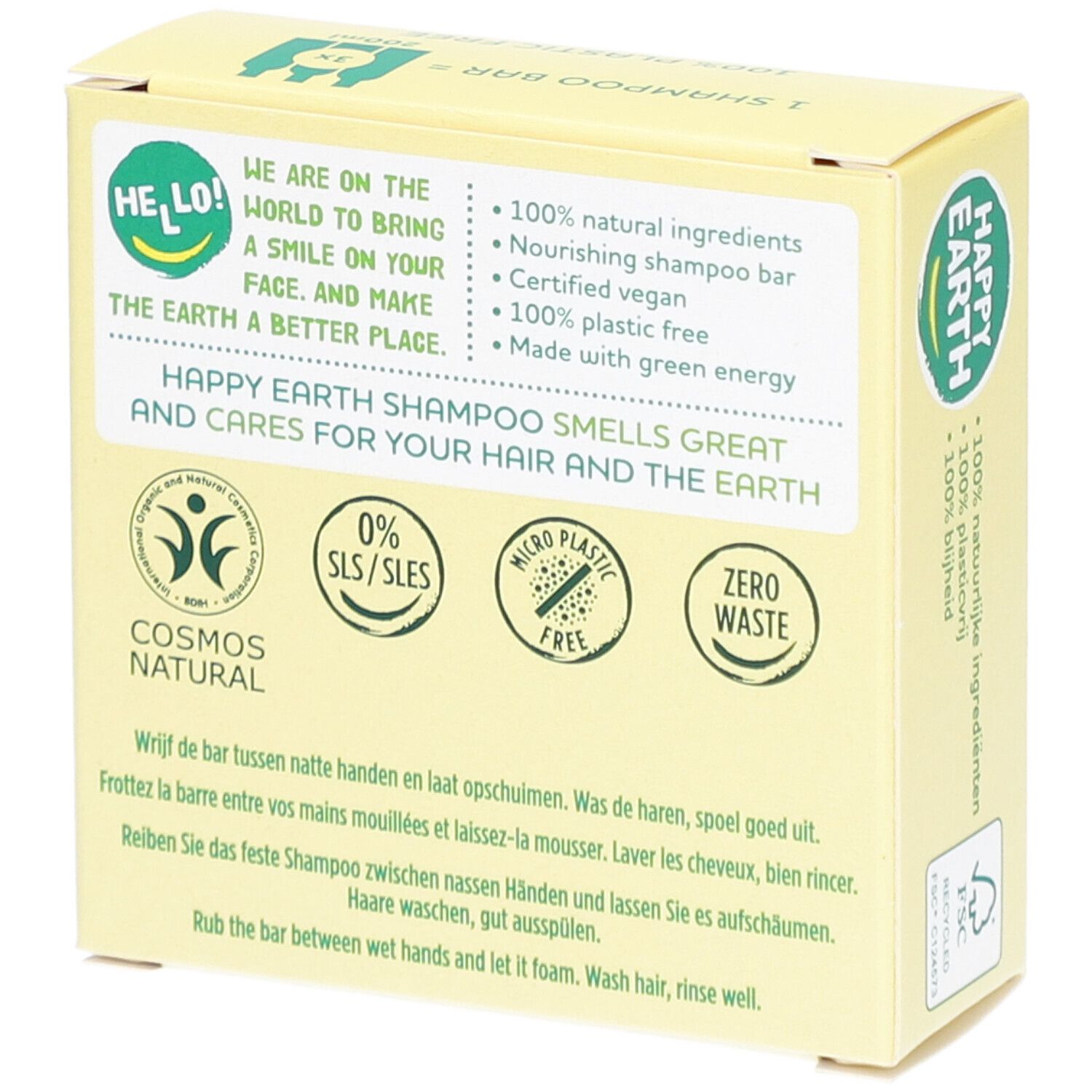 Dos de l'emballage. Inscription: HAPPY EARTH SHAMPOO, COSMOS NATURAL, Zero Waste.