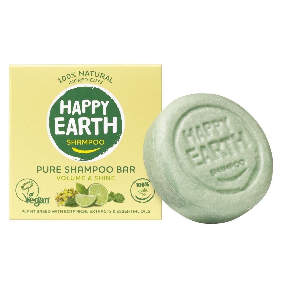 Pain de douche vert et emballage. Inscription: HAPPY EARTH SHAMPOO, Pure Shampoo Bar.
