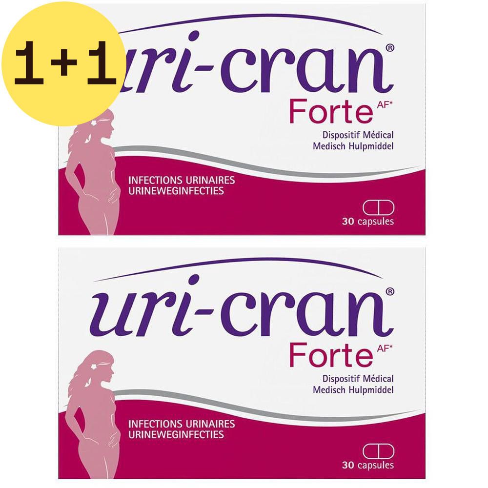 Deux boîtes de Uri-Cran Forte. Emballage blanc avec texte violet et image d'une femme. Contient 30 gélules.