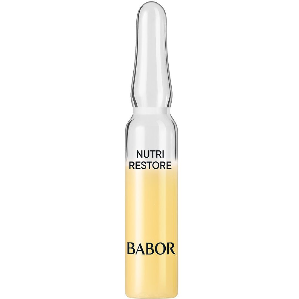 Ampoule transparente avec liquide jaunâtre. Texte : Nutri Restore, Babor.