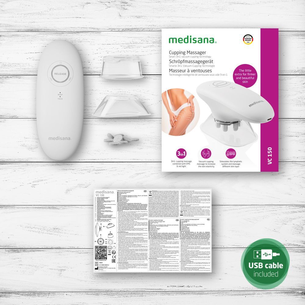 Ensemble de produits : appareil de massage medisana, accessoires, instructions. Sur table. Câble USB.