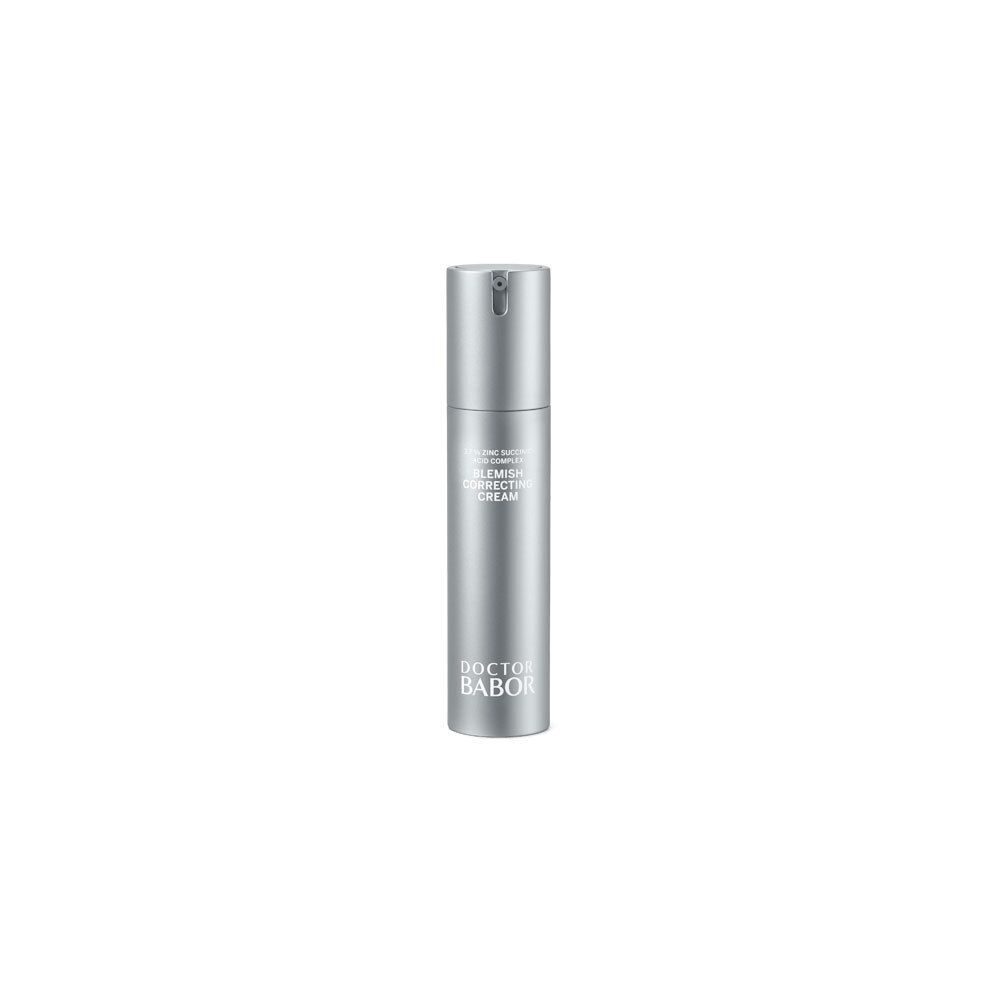 Flacon argenté avec pompe. Inscription : Blemish Correcting Cream, Doctor Babor.