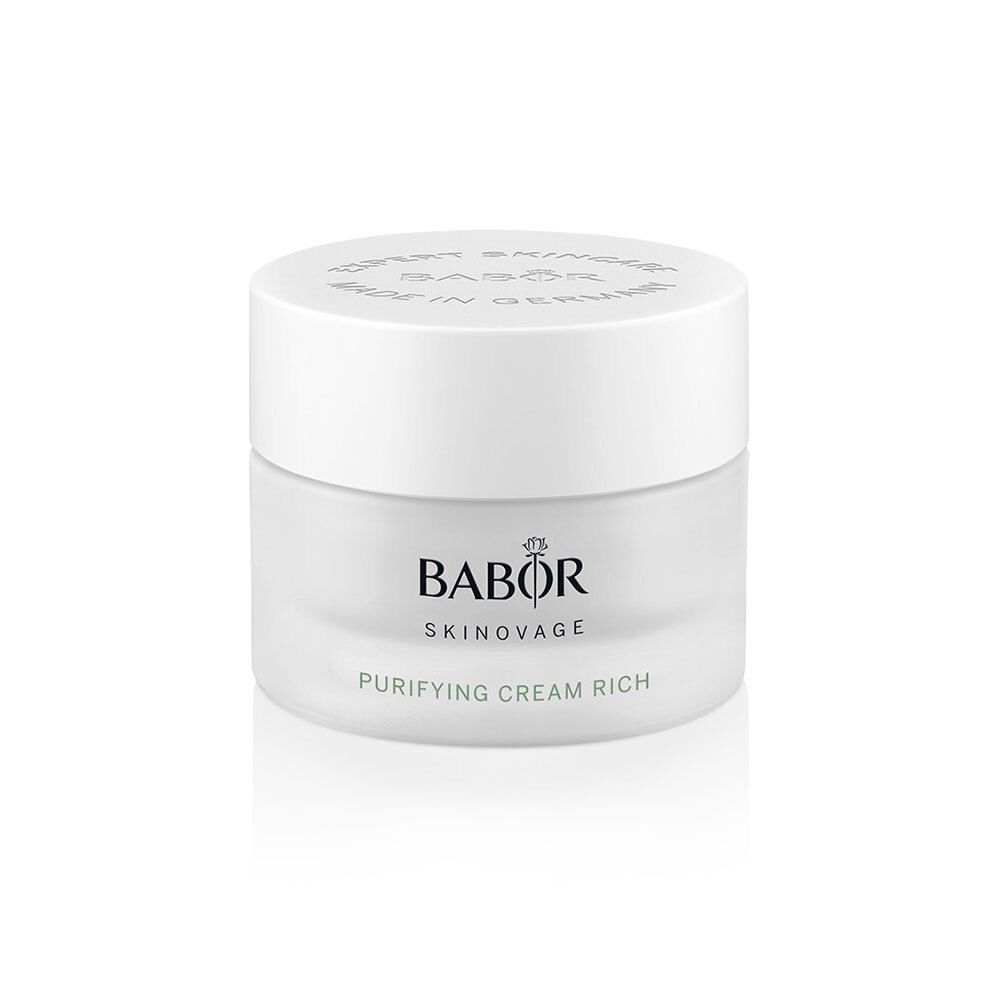 Pot de crème avec couvercle blanc. BABOR SKINNOVAGE PURIFYING CREAM RICH est inscrit sur le verre.