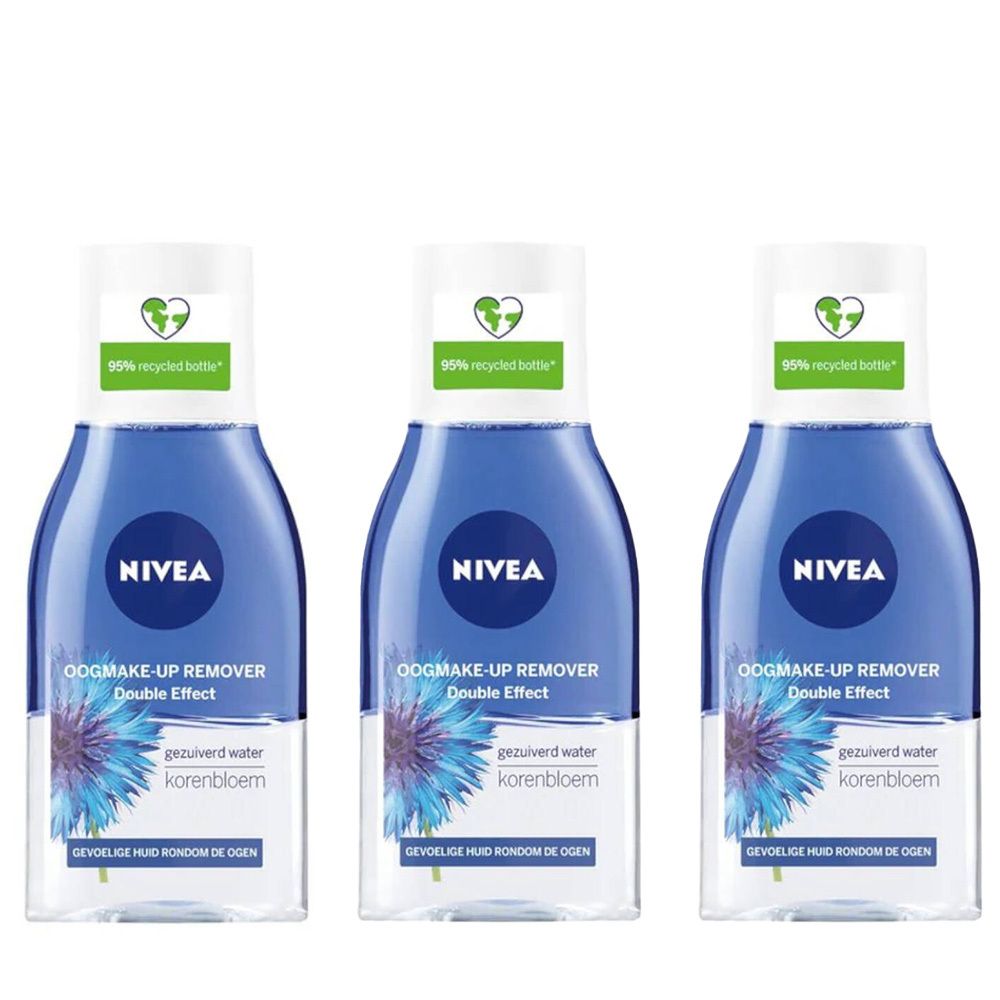Trois flacons de démaquillant pour les yeux NIVEA. Liquide bleu, bouchon blanc, étiquette bleue avec fleur de bleuet. Inscription: Double Effect.