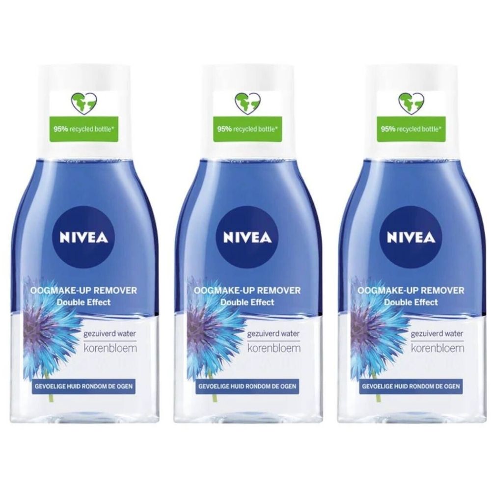 Trois flacons de démaquillant pour les yeux NIVEA. Liquide bleu, bouchon blanc, étiquette bleue avec fleur de bleuet. Inscription: Double Effect.