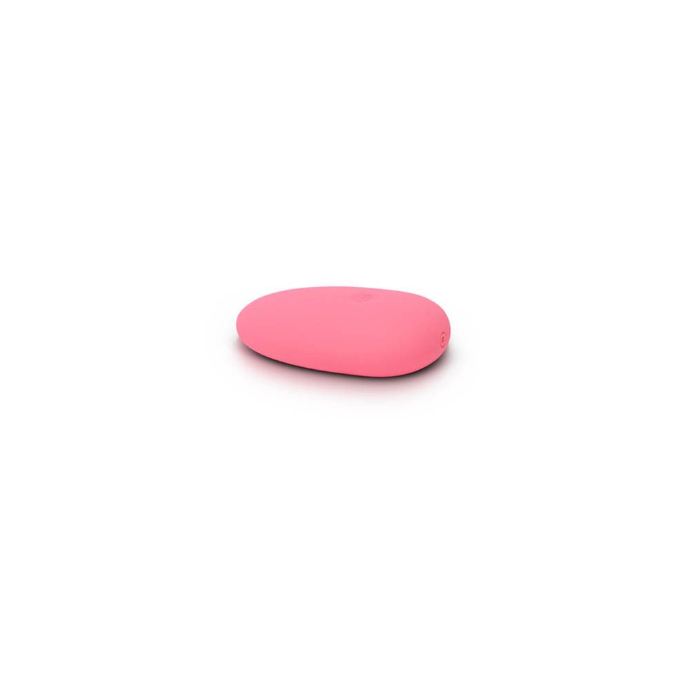 Vibrateur rose en forme d'œuf. Logo: ILS. Surface lisse. Couché.