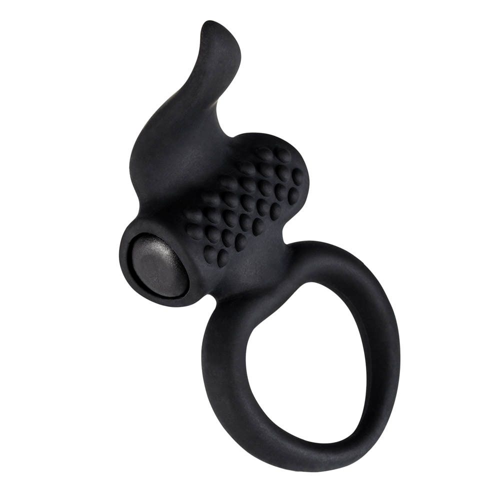 Cockring noir avec texture en relief et forme annulaire.