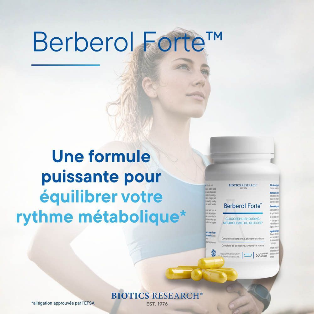 Flacon et gélules de Berbero Forte Biotics Research à côté d'une femme.
