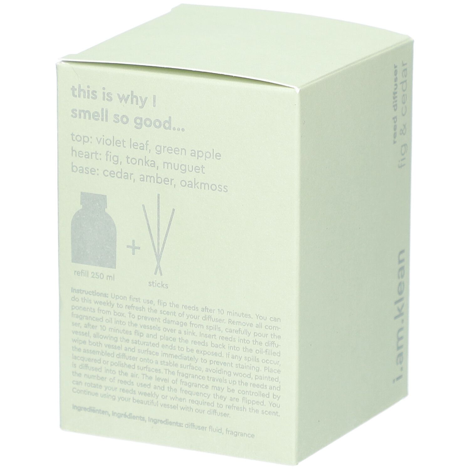 Boîte vert clair. Inscription: i.am.klean, reed diffuser fig & cedar. Texte: notes de parfum, instructions, contenu, bâtonnets.