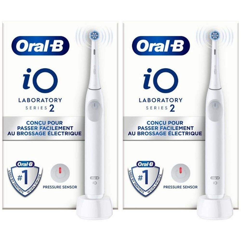 Deux boîtes de brosses à dents et une brosse à dents électrique. Inscription: Oral-B iO Laboratory Series 2. 1+1 GRATUIT.