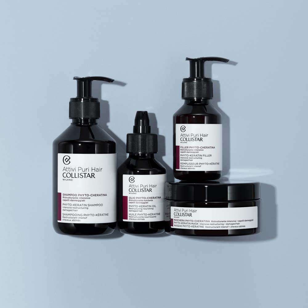 Ensemble de produits avec flacons et pots. L'étiquette indique "Filler Phyto-Keratina".
