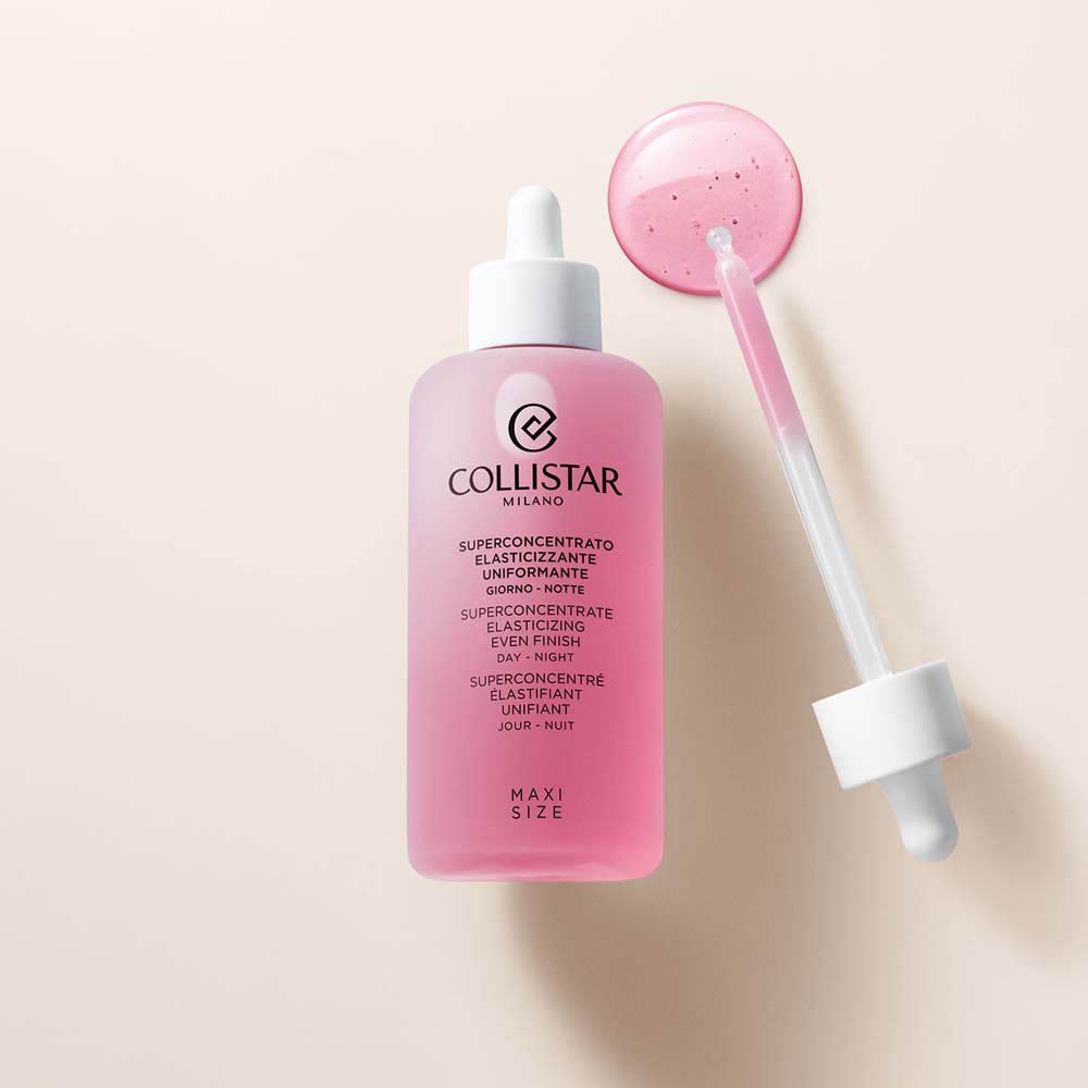 Flacon rose avec bouchon blanc et pipette. Texte: Collistar, Superconcentré Élastifiant Unifiant Jour-Nuit. Maxi Size.